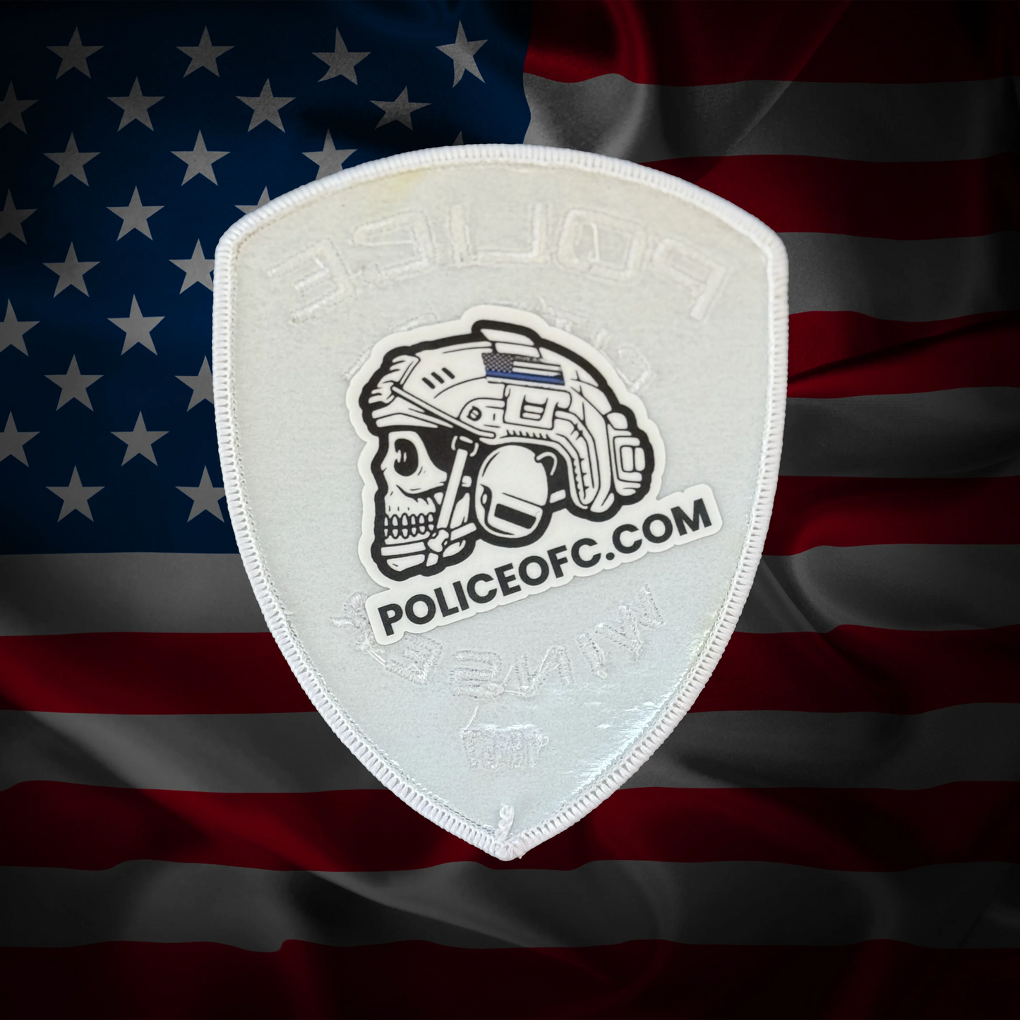 Police patch with helmet design on an American flag background