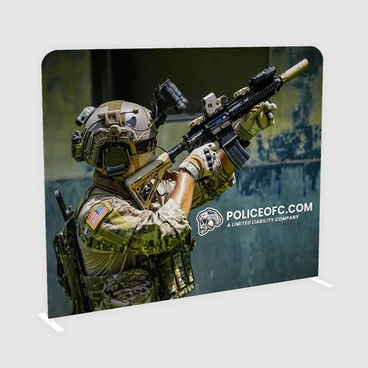 Person in tactical gear holding a rifle with 'POLICEOFC.COM' branding on a stand.