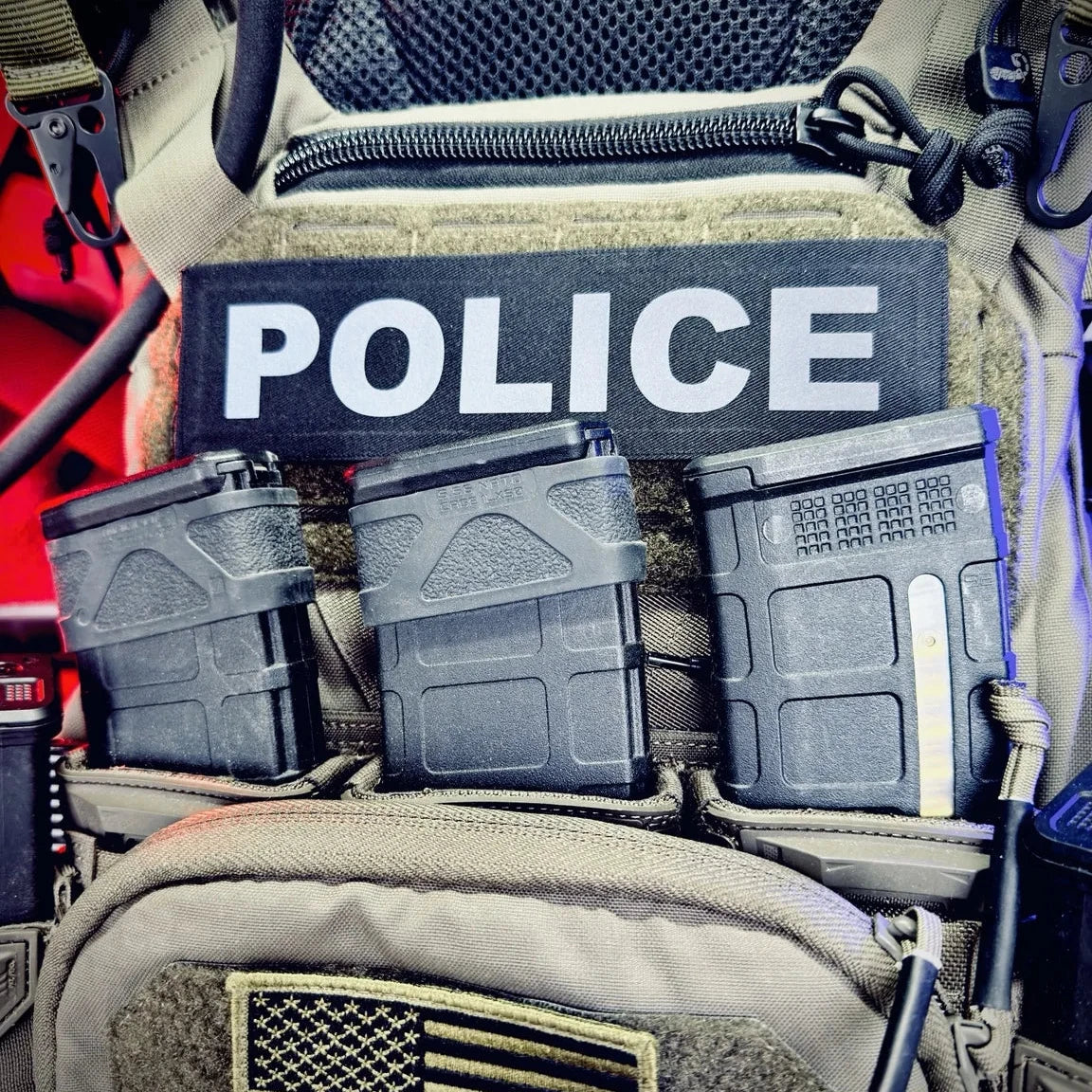 Police tactical vest with equipment and 'POLICE' patch
