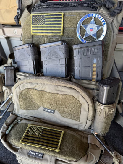  tactical gear with American flag patches and 'United States marshals' flex badge