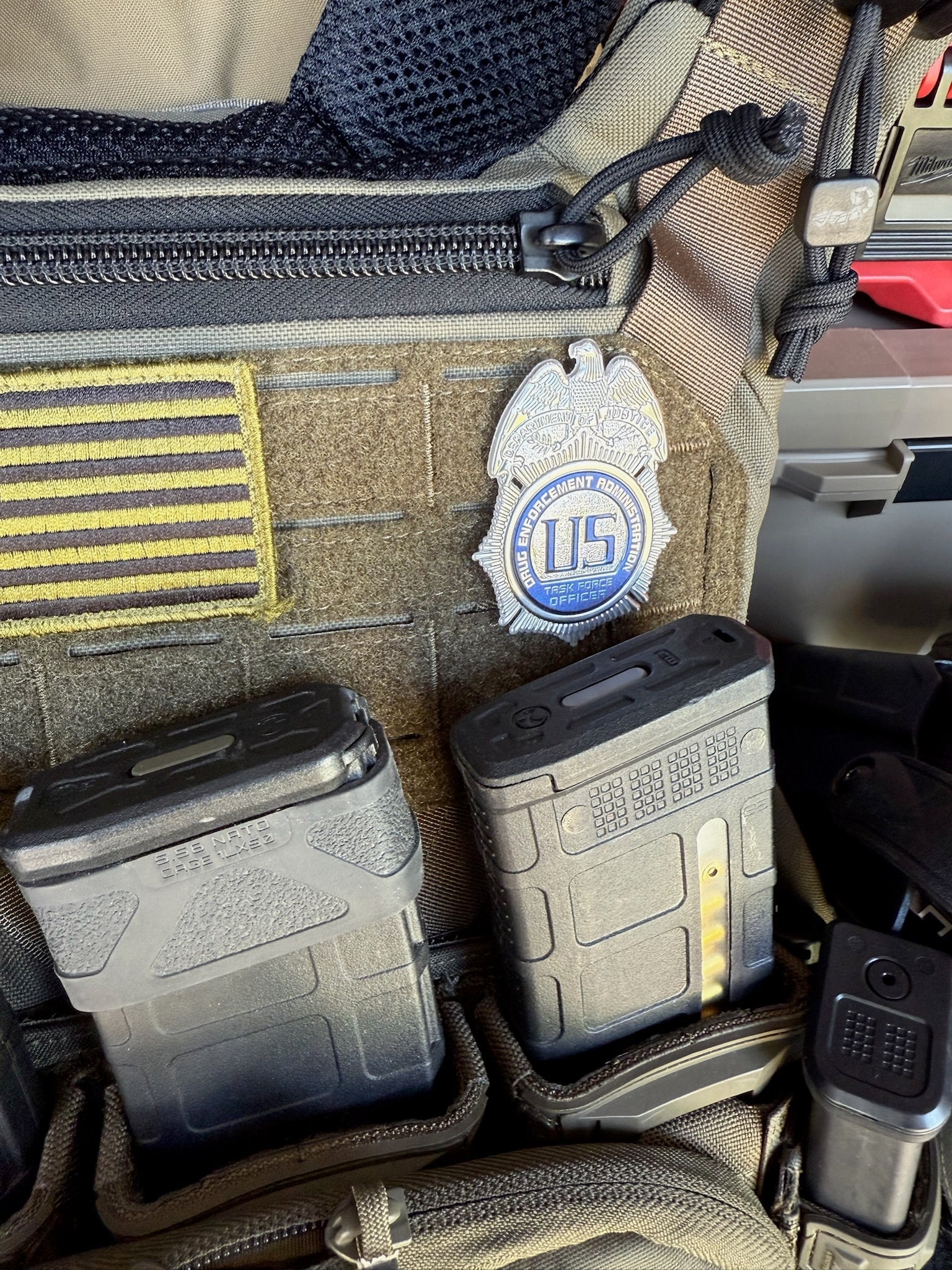 Tactical pouch with U.S. police flex badge and equipment