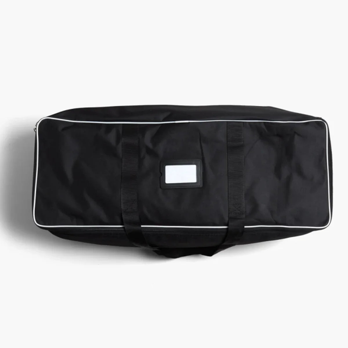 Black duffel bag with white trim on a white background