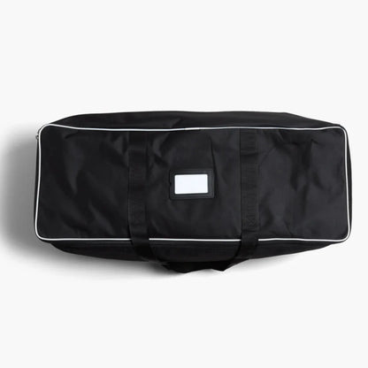 Black duffel bag with white trim on a white background