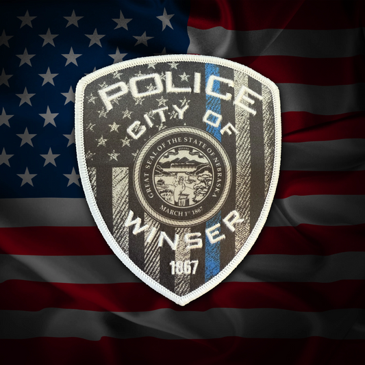 Police badge of the City of Winser on an American flag background