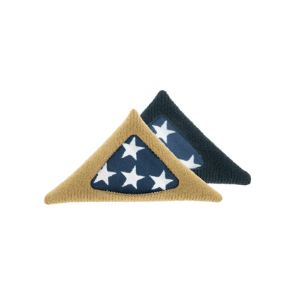 Two triangular beanies, one beige with star pattern and one navy blue, on a white background.