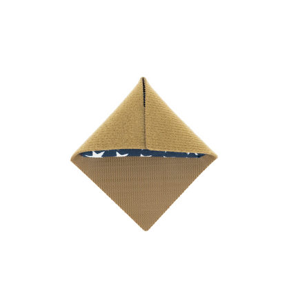 Beige folded fabric with a blue interior on a white background