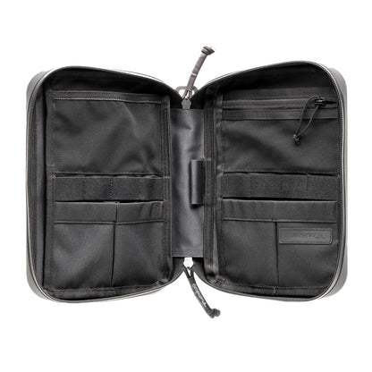 Black tactical pouch with multiple compartments on a white background