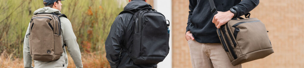 Magpul EDC backpacks and messenger bag in use outdoors, showcasing rugged low-profile design in black and brown colorways.