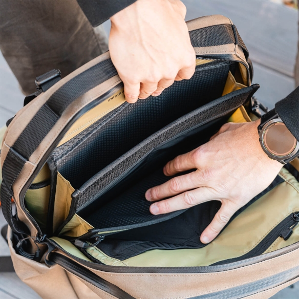 Close-up of the Magpul EDC Media Sleeve inside backpack, highlighting padded laptop compartment and internal organization pockets